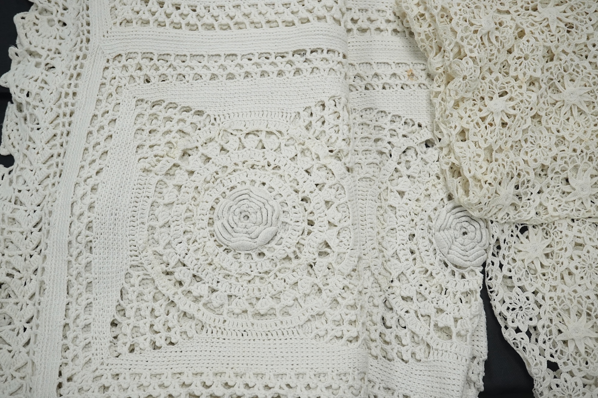 Three Edwardian thick white crochet bed covers, one made from squares with raised crochet flowers to the centres, another cover plainer and the other with loose crochet. 212cm x 166cm. Condition - all appear in good cond